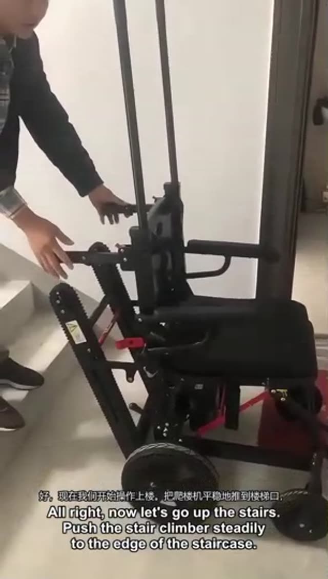 Stair-climbing wheelchair ascending a real staircase